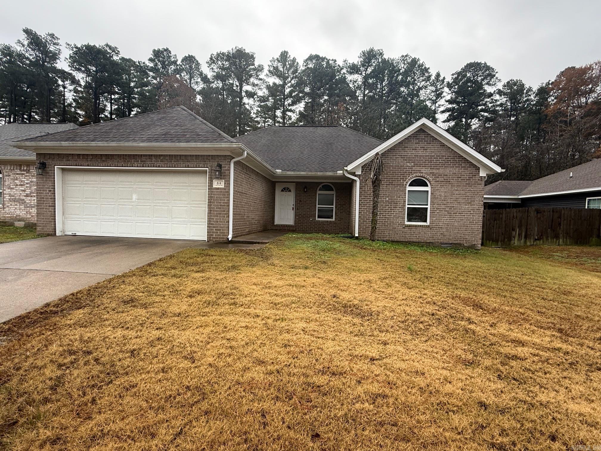 Welcome to 514 Wisteria, a charming 3 bedroom, 2 bathroom home located in the desirable Bauxite School District. This lovely home features a spacious garage, perfect for storing your vehicles or outdoor gear. The open floor plan allows for easy flow between the living room, kitchen, and dining area, making it ideal for entertaining guests or spending quality time with loved ones. Relax and unwind in the large soaker tub, a luxurious feature that adds a touch of elegance to the master bathroom. With a refrigerator included, this home is move-in ready and waiting for you to make it your own. Don't miss out on the opportunity to call 514 Wisteria your new home sweet home. All Prime Realty and Property Management residents are enrolled in the Resident Benefits Package (RBP) for $50.00/month which includes liability insurance, credit building to help boost the resident’s credit score with timely rent payments, up to $1M Identity Theft Protection, HVAC air filter delivery (for applicable properties), move-in concierge service making utility connection and home service setup a breeze during your move-in, our best-in-class resident rewards program, on-demand pest control, and much more!