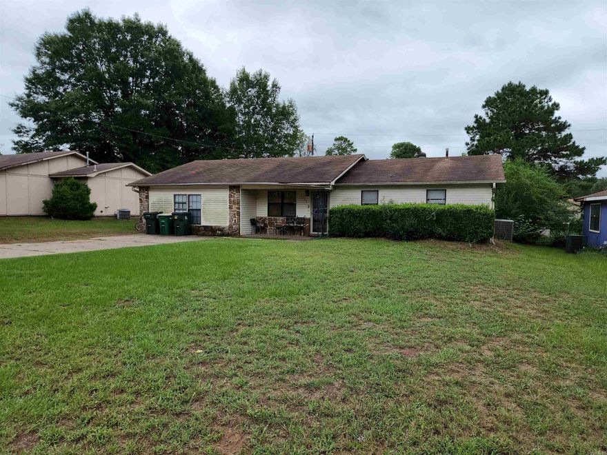 Do you have a large family? Are you looking for space? Well look no further because THIS IS THE HOME FOR YOU!! Its floor plan is SPLIT & has all the bells & whistles; 4 bd, 2 ba, living room, den, dining, fireplace, jacuzzi & sun porch that overlooks the level fenced backyard w/storage building & storm cellar! Kitchen comes fully equipped with appliances, granite counter tops & bar. Huge Den! Huge Master! Large closets! With a little TLC this home would shine bright like a diamond! PRICED WELL BELOW MARKET VALUE ((Property is located in LMI Census area which means 100% Financing offer with Select Lenders)) *****AGENTS SEE REMARKS*****
