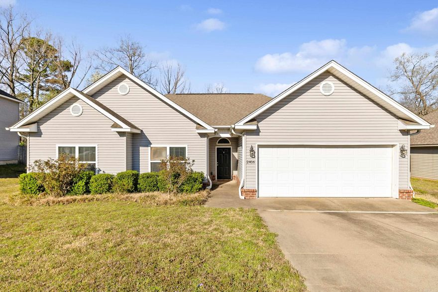 Welcome to this inviting 3-bedroom, 2-bathroom home that perfectly balances comfort and convenience. Nestled in a quiet neighborhood, this property features a fenced-in yard—ideal for pets, play, and outdoor entertaining.  Step inside to a cozy living room with a gas fireplace, with open floor plan flowing into a spacious kitchen. Sink overlooks large back yard, prep island, and the fridge conveys—making your move even easier!  The primary suite includes a spacious layout with an attached full bathroom for privacy and comfort. The two additional bedrooms are generously sized and share a second full bathroom—great for family or guests.  Outside, the fenced yard offers privacy and plenty of space for outdoor gatherings. The two-car garage provides extra storage and convenience. Water heater replaced in 2024.   Perfectly located in Saline County, convenient to schools, food and shops. This could be the one you have been looking for.