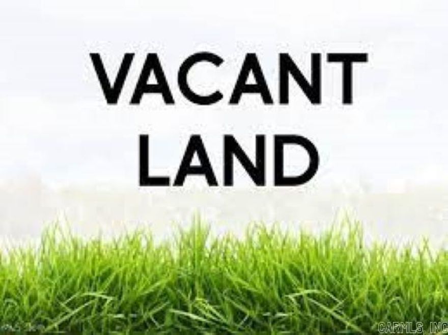 34 acres outside the city limits ~ Property runs with I-40. Is in a flood zone