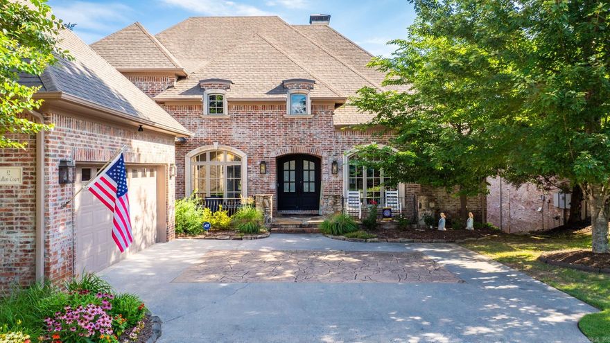 This is an entertainer’s trophy home on the 10th hole of Chenal’s Bear Den course in the gated Hallen Ct. Beautifully updated + immediately impressive open plan gives gorgeous views, tall ceilings, refinished hardwoods, updated lighting, fresh paint, and all new windows w/ plantation shutters & custom Regal Drapes throughout. Large living has gas fire pre-cast stone hearth wrapped with built-ins.  Open kitchen: granite breakfast island, walk-in pantry (new Elfa shelving), breakfast room, +premium apps: beverage cooler, Wolf stove, & Viking fridge. Sunroom offers course views + awesome veranda. Fully fenced yard via spiral stairs.   Stately office + dining room w/ new Swarovski chandelier. Primary suite on main level has access to covered patio. Spa-like bath: double vanities, jetted tub, walk-in travertine shower, + new carpet in walk-in closet. Main level also: laundry +private .5 bath near garage entry.   Up: 2 beds + 2 baths, with walk-in closets.   3 new high-efficiency HVAC units + encapsulated crawl space w/ 2 commercial grade dehumidifiers.