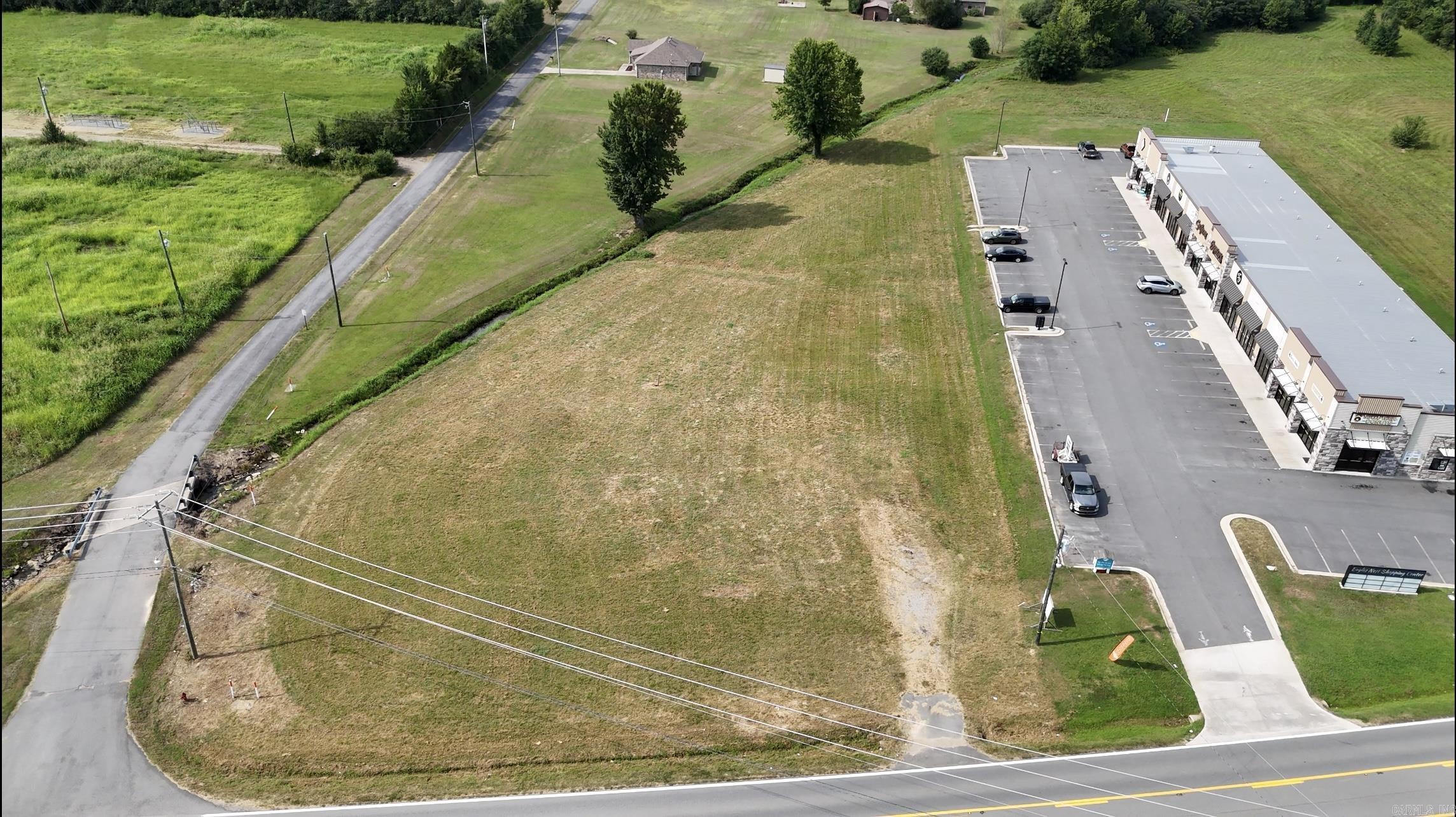 Unlock the potential of your business with this exceptional 1.5-acre commercial lot located on the bustling Hwy 64 in Vilonia. This strategically positioned parcel offers high visibility and easy access, making it an ideal location for retail, office, or service-oriented ventures. This lot is perfect for entrepreneurs looking to capitalize on a growing market and expand their business presence. Donāt miss this opportunity to secure a prime piece of commercial real estate in a thriving area. Contact us today for more information or to schedule a viewing!