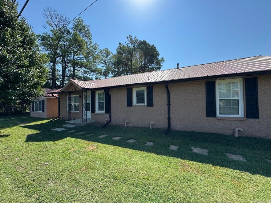 Nicely updated 3 bedroom 2 bath home with a detached shop or she shed for your hobbies. Home has been recently updated and has a large kitchen with lots of storage, dedicated laundry, large primary suite with updated bathroom. Split floor plain with extra storage or living space in the garage. Backyard is fenced and ready for your fur babies, Brick home with metal roof makes maintenance a breeze.