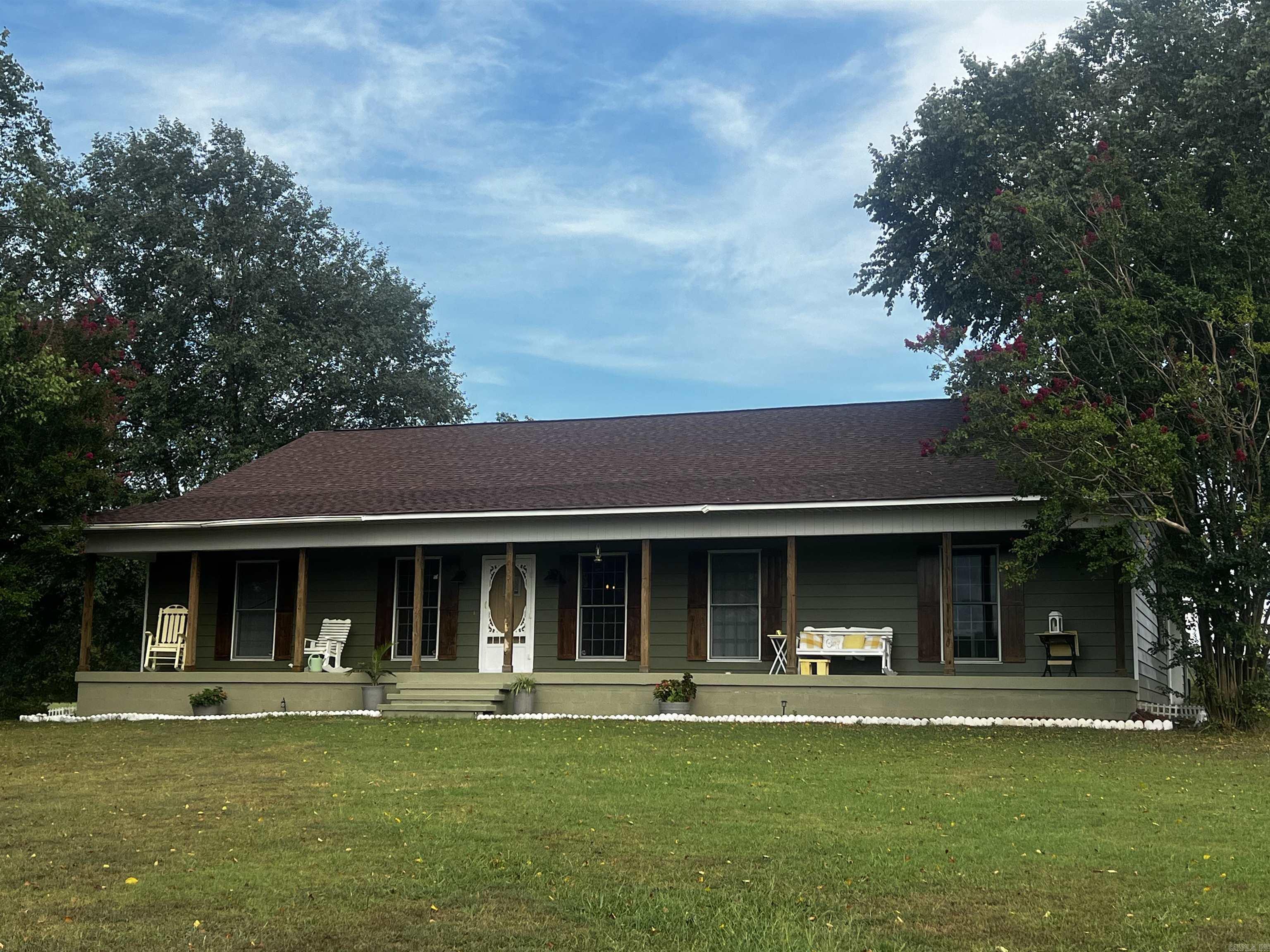 3 bedroom Country home with open floor plan near Heber Springs, on 5.4 acres, watch the sun set on your large covered porch or watch the falling stars if you want to sit deep into the night and watch the sunrise on your back patio while drinking your morning coffee, fenced on 3 sides -90 percent cleared - good grass perfect for a horse or couple of cows or make yourself a large garden. Large mature trees in the yard and a storm cellar for you and your dogs if needed - this home has everything you need to live a quiet peaceful life, 30 x 40 red iron metal shop with power two over sized garage doors