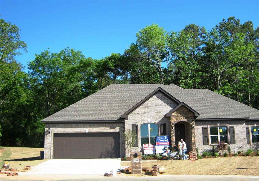 Home backs up to green space, Hardwoods in main living areas, granite and tile are in wet areas.  Master is over sized  with large walk in closet.