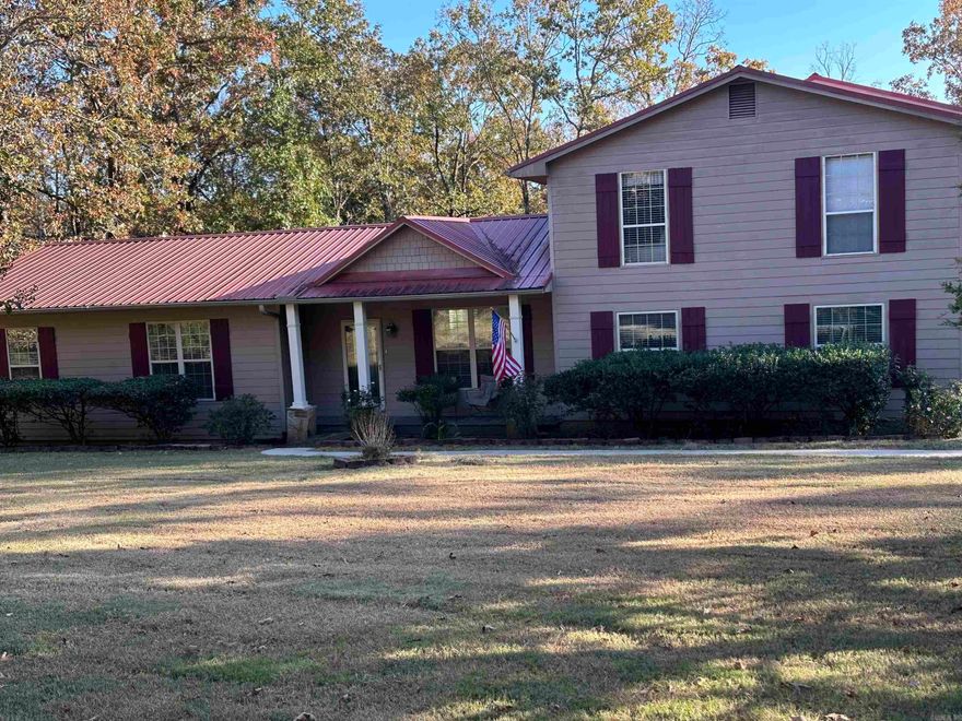 Welcome to your lakefront home on GREERS FERRY LAKE. This charming home, nestled at the end of a quiet dead-end road, offers the perfect blend of privacy, serenity, and modern comfort. This family home has space for your entire family.  Situated on a dead end street, you will enjoy the privacy it offers.  Features 4 bedrooms, 3 baths, separate dining room, and beautiful kitchen.  The oversized master suite is located on main level with master bath including walk in shower, jacuzzi tub and walk in closet.  Also includes a separate laundry room, detached 2 car garage and covered deck.  There is a walking path down to the water not to mention the Heber Springs Recreation Area & Campground just minutes away. This lakefront home offers a unique opportunity to experience the beauty of Arkansas's natural surroundings while enjoying all the comforts of modern living.  Schedule your personal tour and make this dream home your reality!