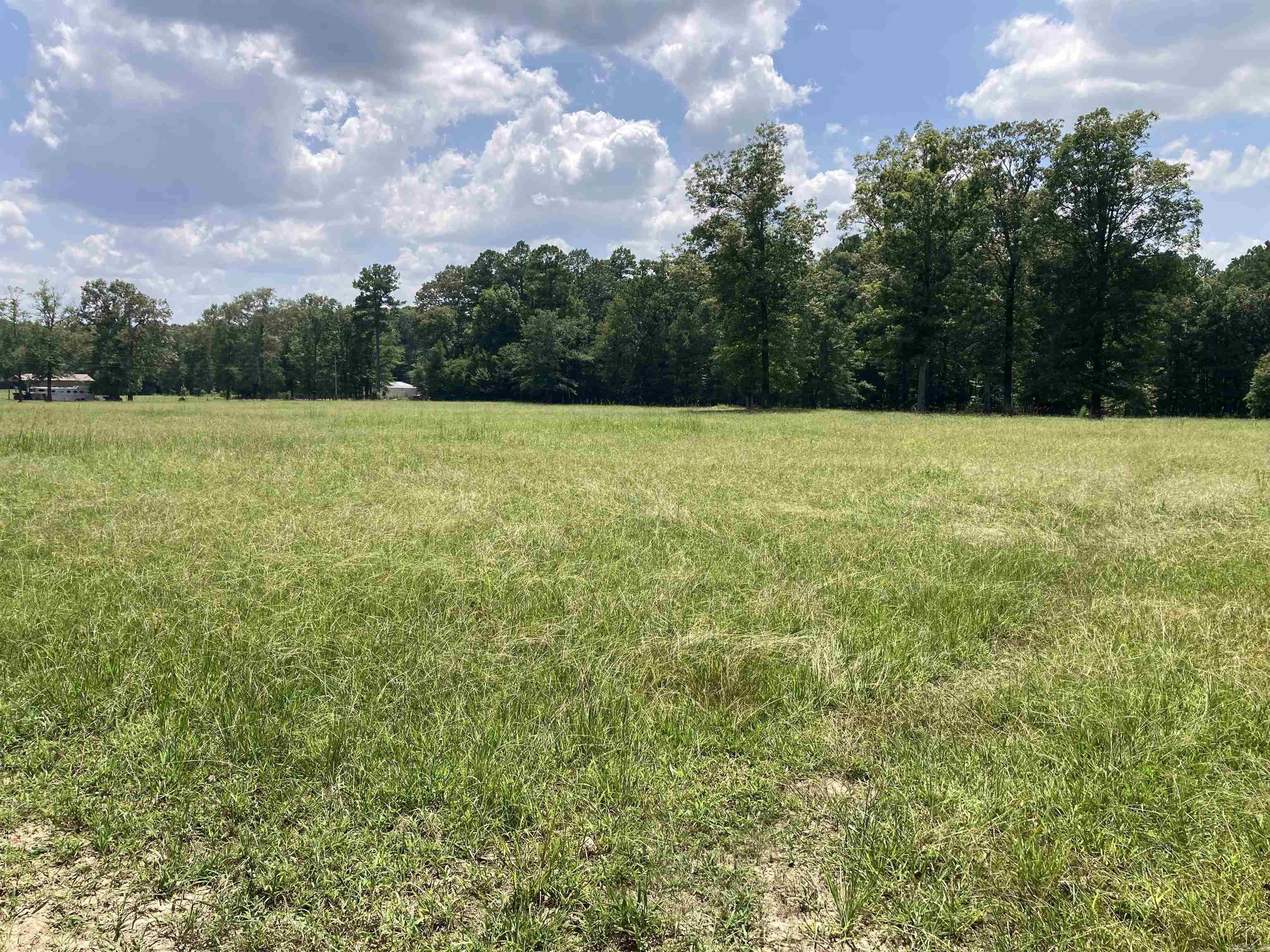 10 acres of open pasture land, fully fenced and with a water meter, ready for your home, livestock, or recreational use. This spacious and versatile property offers peaceful country setting with plenty of room to grow. Whether you're building, grazing, or investing, this land provides a solid foundation for your plans. Quiet location, easy access, and room to roam!