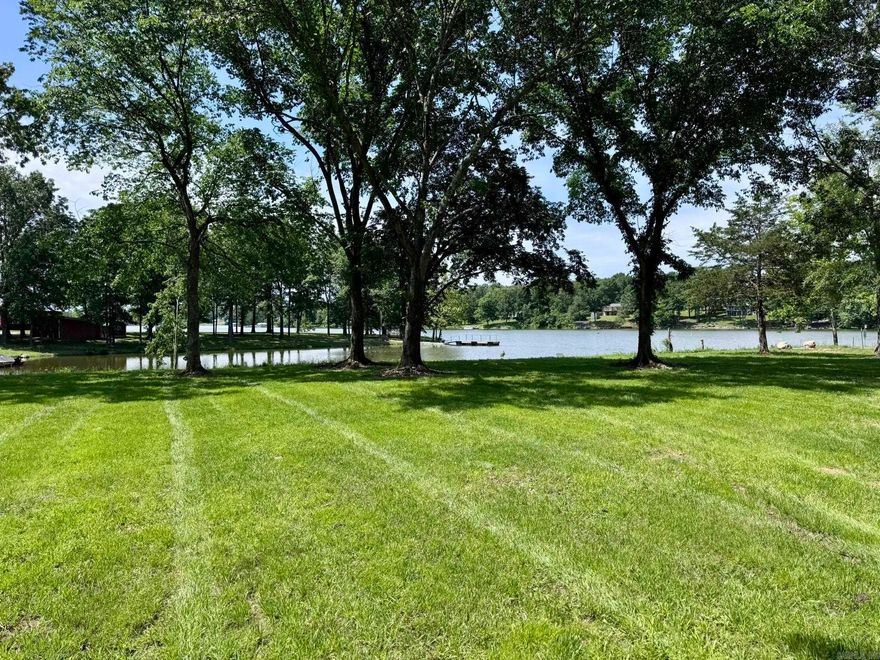Don’t miss this rare opportunity to own a cleared lakefront lot on beautiful Crown Lake in Horseshoe Bend, Arkansas. This 0.63 +/- acre lot is located in the Pleasant Valley Subdivision and offers 195 feet of frontage on the scenic 640-acre Crown Lake. The property is level, shaded with mature trees, and features silt fencing already installed, making it easy to begin your building plans. Utilities are already in place, including water and electricity—saving you time and expense during the construction process. Whether you’re dreaming of a full-time lake home or a peaceful vacation retreat, this lot offers the perfect setting for your vision. Priced at $79,900, it’s a fantastic investment in lakefront living.
