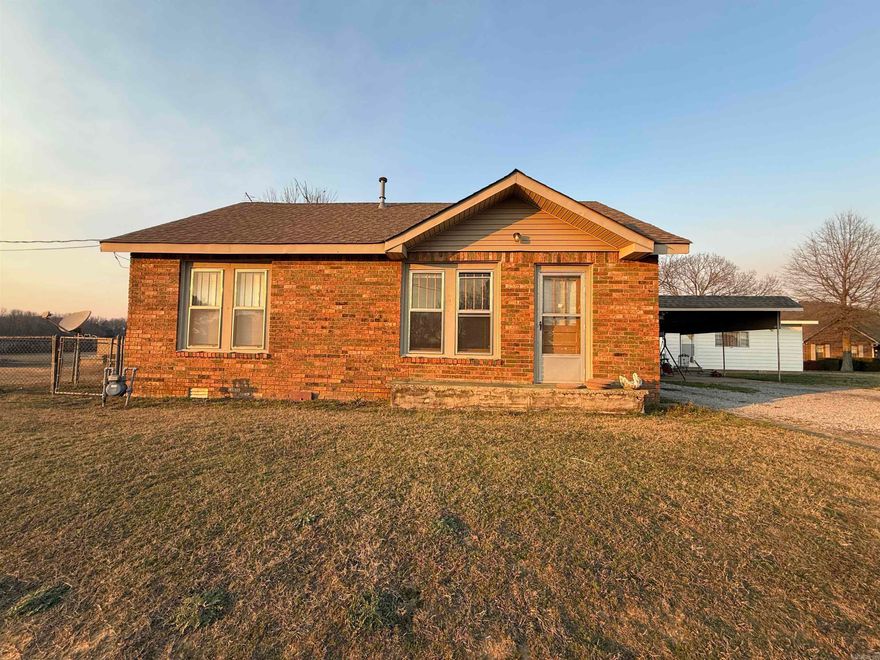 Three-bedroom, one-bath home offering 1,324 square feet with approximately 1.2 acres. Property has been zoned C-2 and is located on Highway 64 West in Beebe, this property provides convenient access to town while still offering room to spread out. The home is currently tenant-occupied renting month to month, making it an option for investors or buyers. The floor plan features a functional layout with ample living space, three bedrooms, and one full bath. Final boundaries and dimensions to be determined by survey. Utilities, access, and driveway in place. Do not disturb the tenant. Showings by appointment only with 24 hours notice. Property to be sold AS-IS.  AGENTS see remarks please.