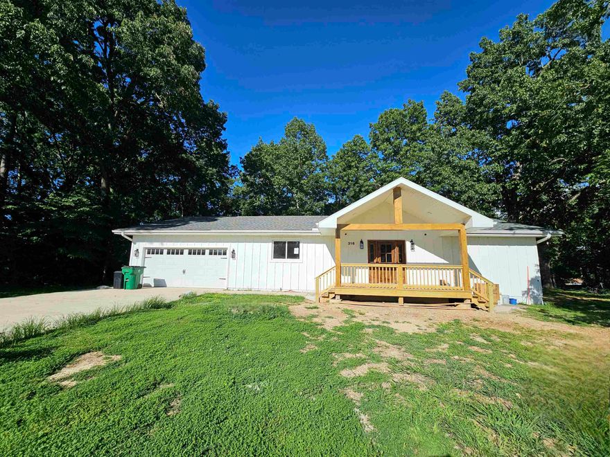 Fresh complete remodel! This 3bed, 2 bath home has been reinvented with a complete remodel. Lake views, 2 Fireplaces, 4 Lots, 40Lx48Wx14H shop, 2 Decks, and plenty of space, this home is the perfect Vacation Home. Utilize the 800 sq ft basement for game room, office, workout area, or more! Modernized living meets quiet lake town with this beauty. This home was built with out holding back. New Concrete Driveway, new 40 year warranty roof, spray foam insulation, new service wiring to meter base at pole, new braker panel, all new wiring throughout, instant hot gas water heater, large dual head walk in shower in master, jacuzzi tub in main bath, and bluetooth speakers in main bath.  The local amenities will keep you busy with the multiple lakes and rivers, 2 Golf Courses, and more. Also utilize a $6,000.00 allowance to pick out your choice of appliances for the kitchen. Also enjoy the 40x48x14 shop that has 2 - 10x12 overhead insulated doors, 1 - 12x12 insulated overhead door, plumbed and wired for bathroom with electric instant hot water heater, 50 amp rv outlet and 50 amp welding outlet, wired for mini split, and high bay LED lighting.