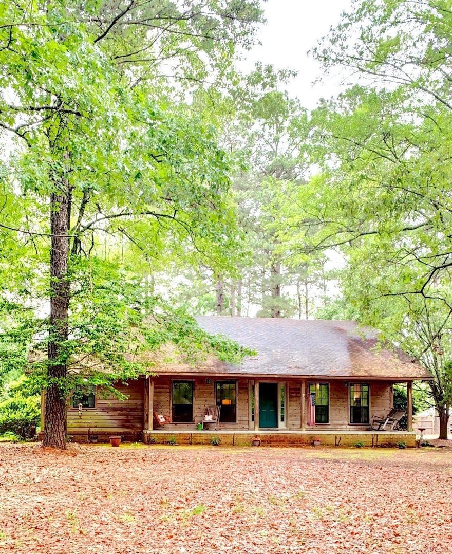 Please take a moment to admire this charming home that offers the perfect blend of rustic serenity and modern comfort on a sprawling 2-acre lot. You'll feel welcomed as you drive up the winding path through a mostly woodland setting. This home features 3 bedrooms, 2 full baths, and a generous size living room plus so much more! With all of it's comfortable interior spaces and scenic natural setting, this property has got to be at the top of the list for homes to see. Don't miss your chance to make this idyllic home your own – schedule a showing today!