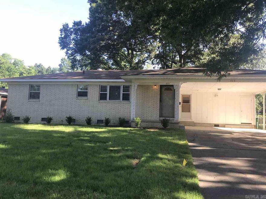 This home is super clean and features great space.  lives larger than the square footage , Large open eat in kitchen with stained wood cabinets , updated appliances, beautiful hardwoods tile in bathrooms in very good condition, large utility laundry worm with gas and electric connection, wonderful level yard , with mature trees oversized double carport, A must see, close to Churches, Schools, lots of shopping malls and grocery stores, convenient stores , Post office and mush more , fantastic location