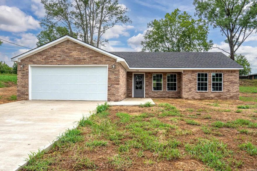 New Build! Nice big lot 420x145. Brick home with open floor plan, cathedral ceilings, split bedrooms with living & dining combined.  Custom kitchen has all stainless appliances with granite countertops. Laundry room is by garage making it easy access for unloading vehicles.Property has city water and sewer; lawns have been leveled and grass sown for the great yard coming soon!Back door steps out to large yard great for cooking and entertaining! Just a few minutes to Caddo River to canoe, fish and play!