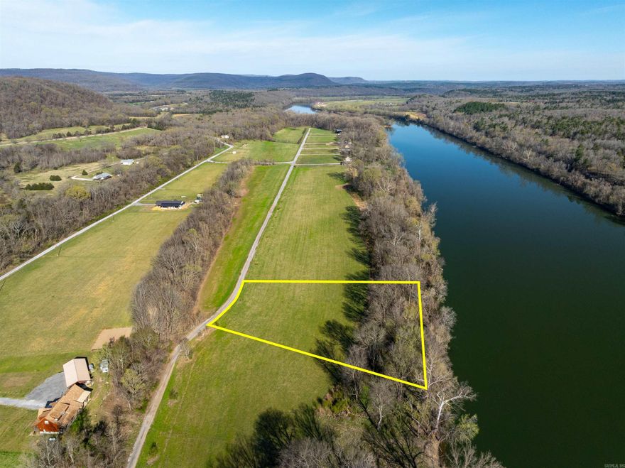 Prime Riverfront Lot in Gated Community on the World-Famous White River!  This stunning 1.82± acre lot offers a cleared, ready-to-build site with several feet of direct river frontage. Nestled in a gated community, you’ll enjoy exclusive access to a private boat ramp, making it easy to get on the water in minutes. Imagine stepping out your back door to breathtaking river views and fishing just steps from your property!