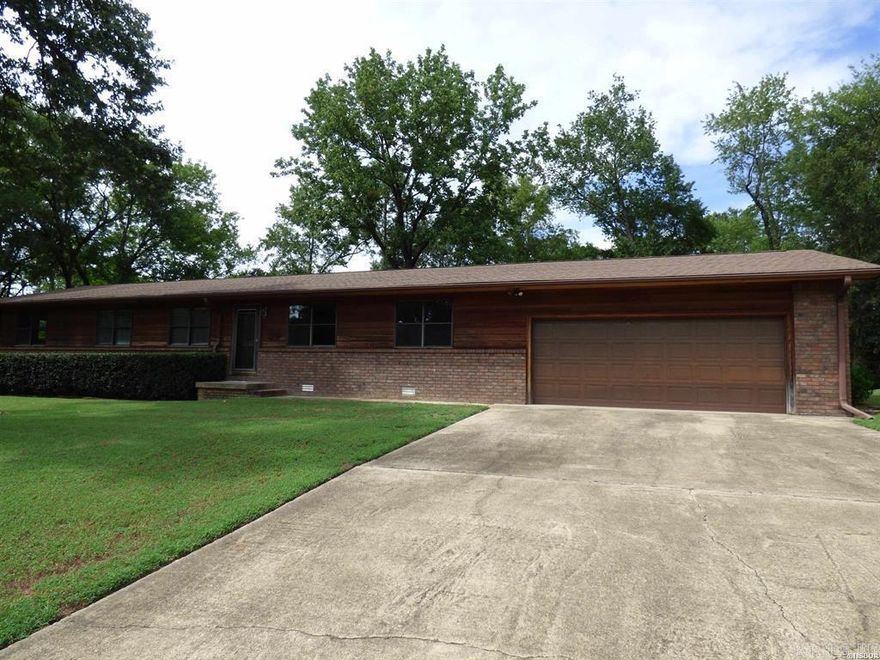 Welcome to your private retreat nestled on nearly 2 acres in Lakeside School District with a detached 20x30 dream shop, ideal for hobbies, storage or a home business.  This ranch style has everything you need on one level including 4 bedrooms and 2 full baths with a 1/2 bath in the gas heated shop.  Freshly painted with newly installed flooring throughout for a clean, modern feel.  The stylish butcher block counter tops add warmth and character. Updated lighting and ceiling fans elevated every room.  The back yard has a lovely deck and is fenced making it perfect for pets, play or entertaining.  The side yard has a sport court with a basketball goal for endless outdoor fun.  This property offers a blend or comfort, functionality, and outdoor living.  Whether you're looking for room to roam, space to create, or a peaceful place to call home - this one checks all the boxes.