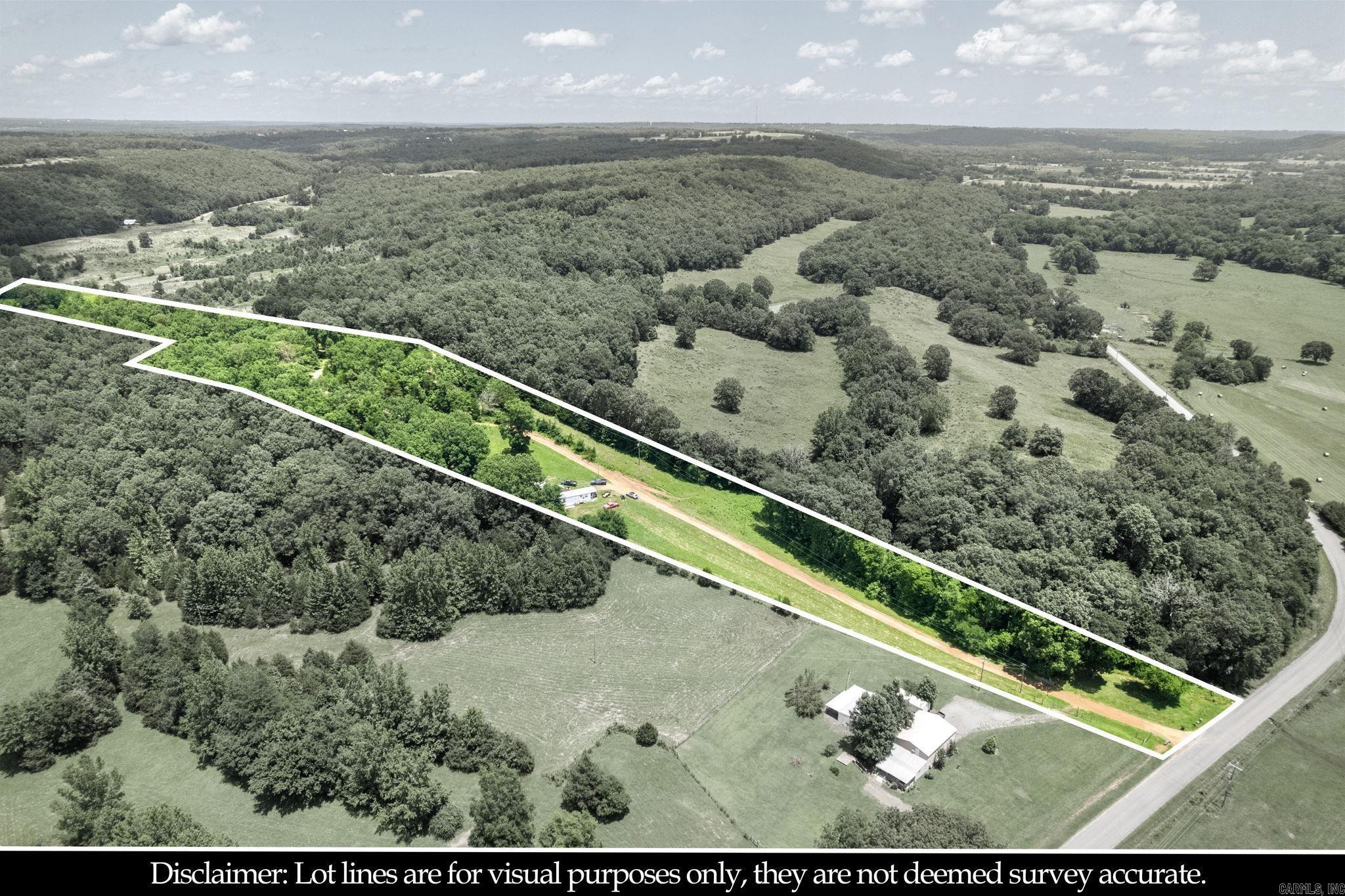 If you are looking for acreage, look no further. This property has it all. Sloped and with a stream. Lots of turkey and deer on the property. This property comes with a mobile home that is about 900 sqft, this mobile home does not have a permanent foundation. Property is sold as is.