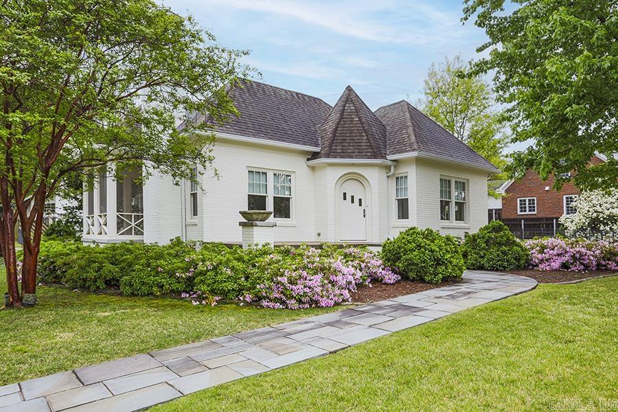 Absolutely charming remodeled bungalow on 2 lots. Completely renovated- new roof, windows, sheet rock, wiring, plumbing, ceiling joists and more. Also has home generator. Will not divide the two lots. Floored attic with permanent staircase in garage. Whole house generator. Sales price not subject to house appraising for sale's price. Property being sold AS IS.