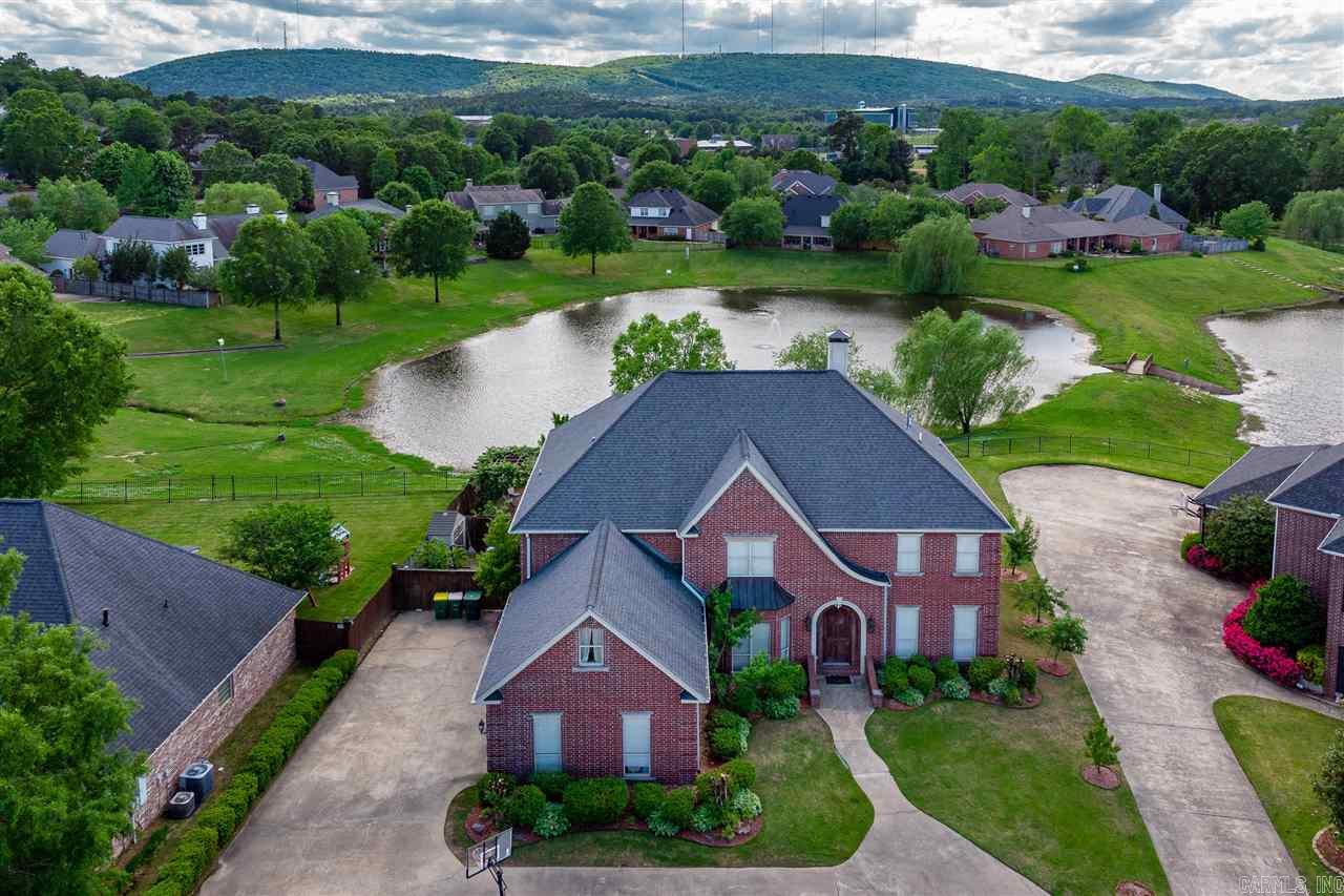 RARE opportunity! Waterfront living, fishing, access to Little Maumelle River, community dock, cul-de-sac. Open floor plan 20' ceiling in hearth room, stone fireplace, hardwoods. Updated kitchen, island, new fixtures. Enjoy water views from newly enclosed sun porch. Office off of laundry, large game room, versatile floor plan. Cozy pergola in backyard to enjoy beautiful sunsets and view of Pinnacle Mountain.