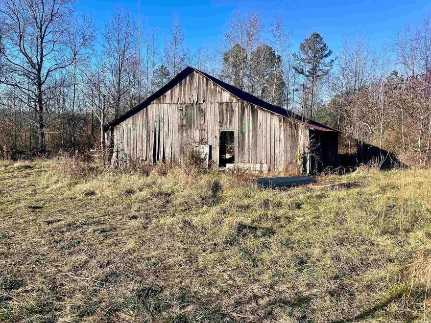 Located just off Highway 16 with over a quarter-mile of county road frontage, this picturesque old homestead combines open fields, mature timber, and abundant wildlife, including deer, turkey, and bear. Ideal for nature enthusiasts and outdoor adventurers, the property is just half a mile from Gulf Mountain Wildlife Management Area and only 5 miles from the Ozark National Forest, offering incredible hunting, recreation, and ATV riding trails. Fairfield Bay Marina on Greers Ferry Lake is a short 30 miles and offering some of the States best boating and fishing. The land features gentle slopes and multiple building sites, making it perfect for creating your dream home or getaway. A tranquil pond provides a serene spot for fishing or relaxation, while the historic barn adds character and potential for use. Utilities, including electricity, rural water, and internet, are conveniently located along the county road, offering easy access for development. Whether you're looking for a recreational retreat or a serene homestead, this property offers the perfect mix of location, beauty, and potential.