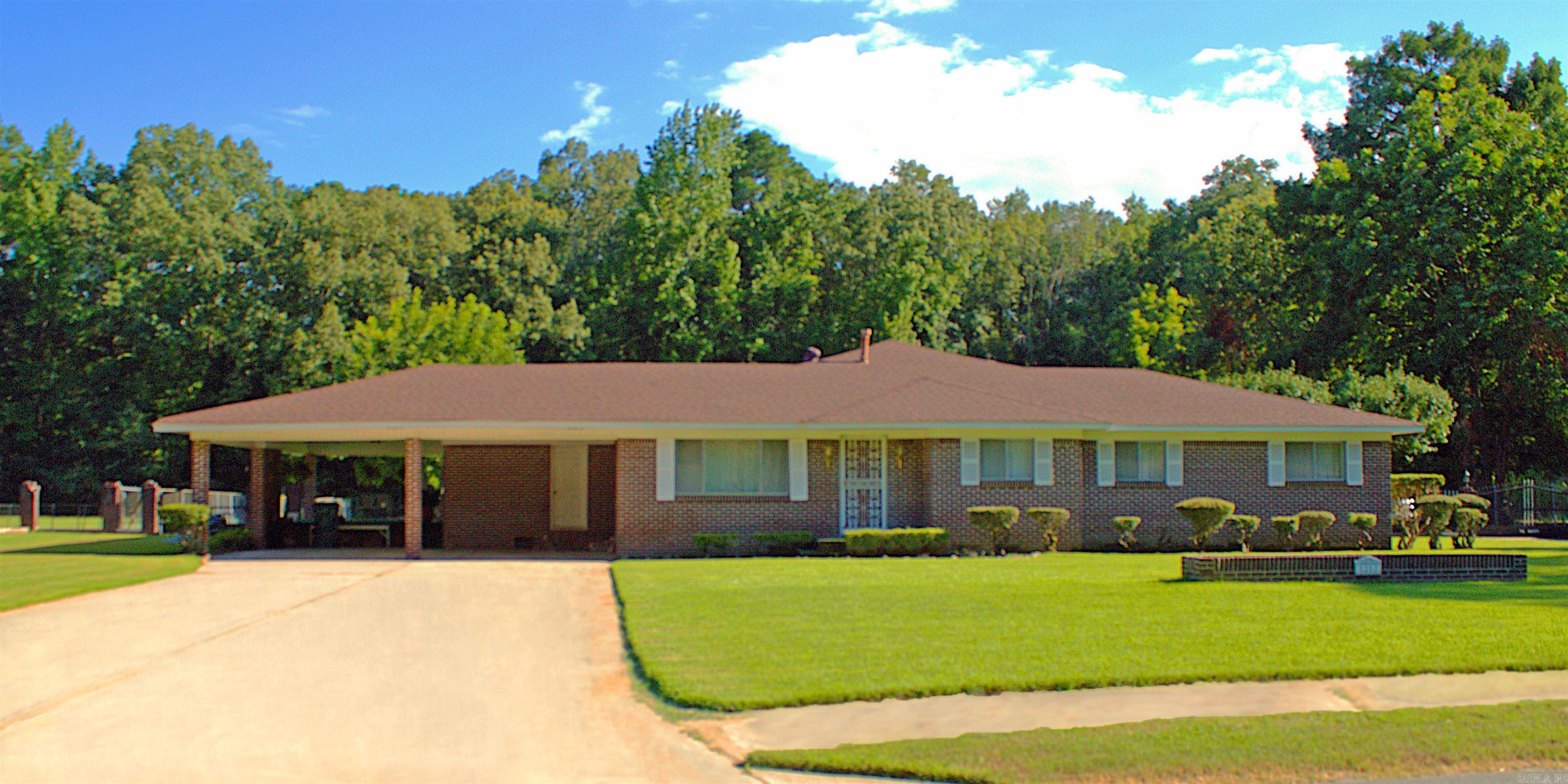 Don't miss out on this well preserved home with so many amenities. This home offers a beautiful covered patio for all your outdoor activities along with a indoor sunroom. Fenced in backyard that is made for entertaining. It offers a spacious building in the back yard with a 2 car carport. This house offers a long drive way with a 2 car carport. 4bedrooms and 1 huge master bedroom with a sitting area. A huge den that is attached to the sunroom. Formal living room, eat in kitchen. This is a must see. SOLD AS IS
