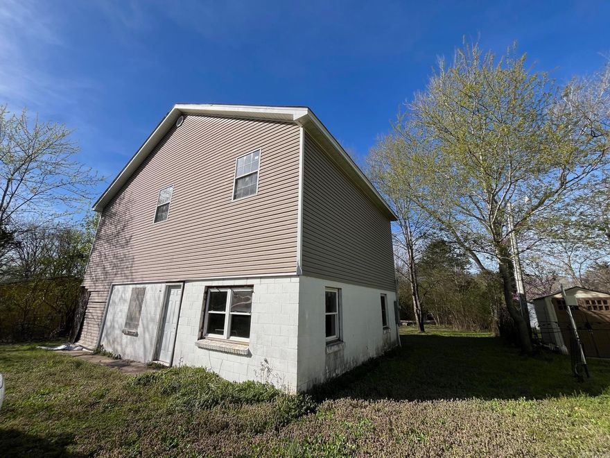 Pick your interior design in paint color and floor coverings. Property is sold as is with no seller's disclosure. the home has a nice setting between Sherwood and Jacksonville.