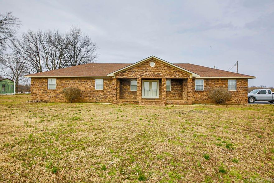 This charming 3 bedroom 2 bath home is located in Phillips County, AR. It is approximately 25 minutes from Helena, AR and 30 minutes from Marianna, AR. The quaint location offers 1.33 acres of land with an abundance of the outdoors to be enjoyed, both from your front porch and the surrounding area! The home features a back deck that would be perfect to sit out and relax with a view of your back yard.