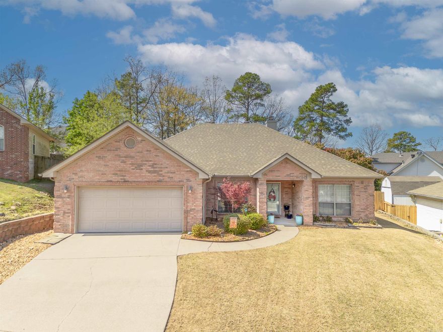 Dashing!!Debonair! Don't Miss out! 5 TOPAZ LANE. 2009 SQ FT 3beds/2baths, Split Floor Plan, 9FT Ceilings throughout that provide lots of natural lighting. Impeccable well maintained home. Kitchen offers granite tops, stainless steel appliances, eat in kitchen and breakfast bar. Spacious Living Room with gas logs Fireplace. Separate Dining Area/Office/Open Bonus Space. Gorgeous hardwood floors and tile, bedrooms have carpet. Primary Bedroom Suite offers a Luxurious Bathroom, double sink vanity, walk in shower, jetted tub for soaking those cares away and a large walk in closet. Laundry Room located off kitchen next to garage comes with a handy mop sink. Two car Garage includes a built in storm shelter beneath. Rest awhile on the front porch, screened in patio with retractable shades and adjoining open patio. Located in a very quiet neighborhood. Roof 2021, HVAC 2016 Service Records. AGENTS SEE REMARKS! Gentle upslope driveway. House and backyard sits level with a gentle upslope towards the back.