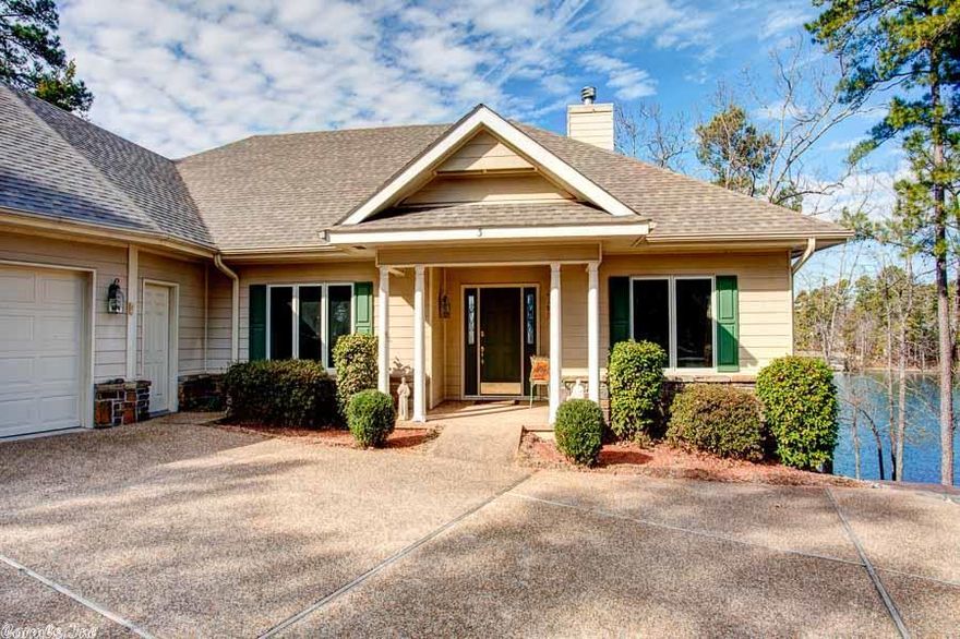 Beautiful home on Lake Balboa in Hot Springs Village. This spacious home features stunning views and natural light throughout. Recently updated and well-maintained.