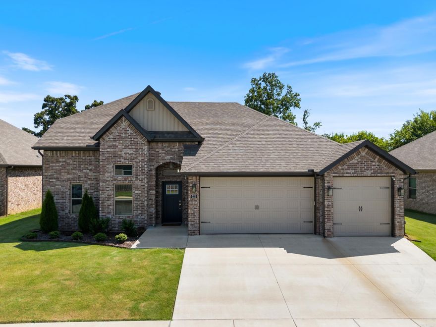 This beautiful, modern four-bedroom, 2 1/2-bath house is situated in the west side of Fayetteville within the Farmington school district. Just minutes away from the university of Arkansas, shopping, and entertainment, this home boasts an open-concept floor plan with open living, dining, and kitchen area with gas fireplace, a split-bedroom design with the master suite located downstairs, and three additional bedrooms and a full bath upstairs. The property includes a three-car garage, a spacious, flat backyard with no neighbors behind the house that is ideal for adding a pool or patio. Featuring granite countertops throughout, the kitchen features a new five-burner gas range with a hood and stainless steel appliances. Fridge is negotiable! Additional highlights include a large laundry room, an office nook adjacent to the master suite, and a generously sized master bedroom with a walk-in tile shower, a large tub, and separate closets. The house also offers a large decked attic for extra storage and is situated in a desirable neighborhood. As a relatively new build, this immaculate home is move-in ready. Schedule your showing today!