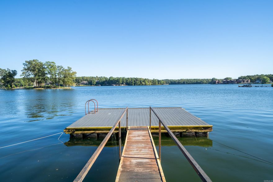 Experience lakeside living with this 1 bedroom 1 bathroom condo on Lake Hamilton. Turnkey and short term rental ready, it also makes a wonderful full time home or vacation retreat. The complex offers a saltwater pool, private boat launch, and beautiful water views to enjoy from your balcony. Your perfect spot on Lake Hamilton- whether for living, relaxing, or investing. Call today to schedule your showing!