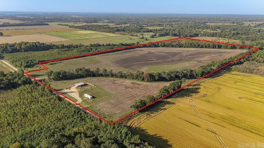 PRICED BELOW APPRAISAL! 81 acres M/L of fully fenced ground with 2 creeks. 15 of those acres are wooded and the rest is open field. There is a charming and welcoming Mobile home with 3 bedrooms and 2 baths. 40x60 covered barn will convey. This property is perfect for those looking for country living, wide-open views, and room to grow.