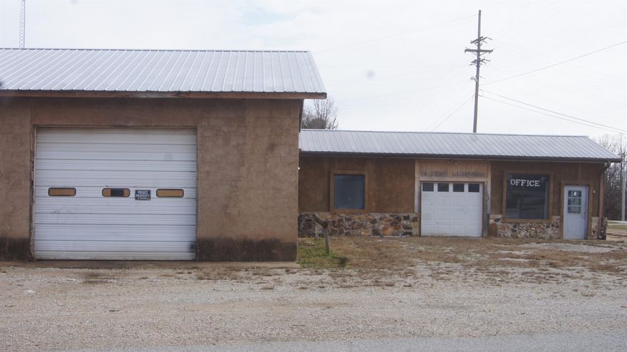 This 2-acre property boasts a versatile commercial shop, ideal for a variety of businesses. The spacious building features 5 bays, including one with a generous 12-foot height, perfect for accommodating larger vehicles or equipment. Inside, you'll find 2 lifts and an air compressor for convenient maintenance and repairs. The office space provides a professional setting for business operations, while the apartment offers convenient living quarters for owners or employees. Ample parking is available, ensuring easy access for customers and staff. This well-located property presents an excellent opportunity for entrepreneurs seeking a functional and convenient workspace. The sale includes land & building-no business.