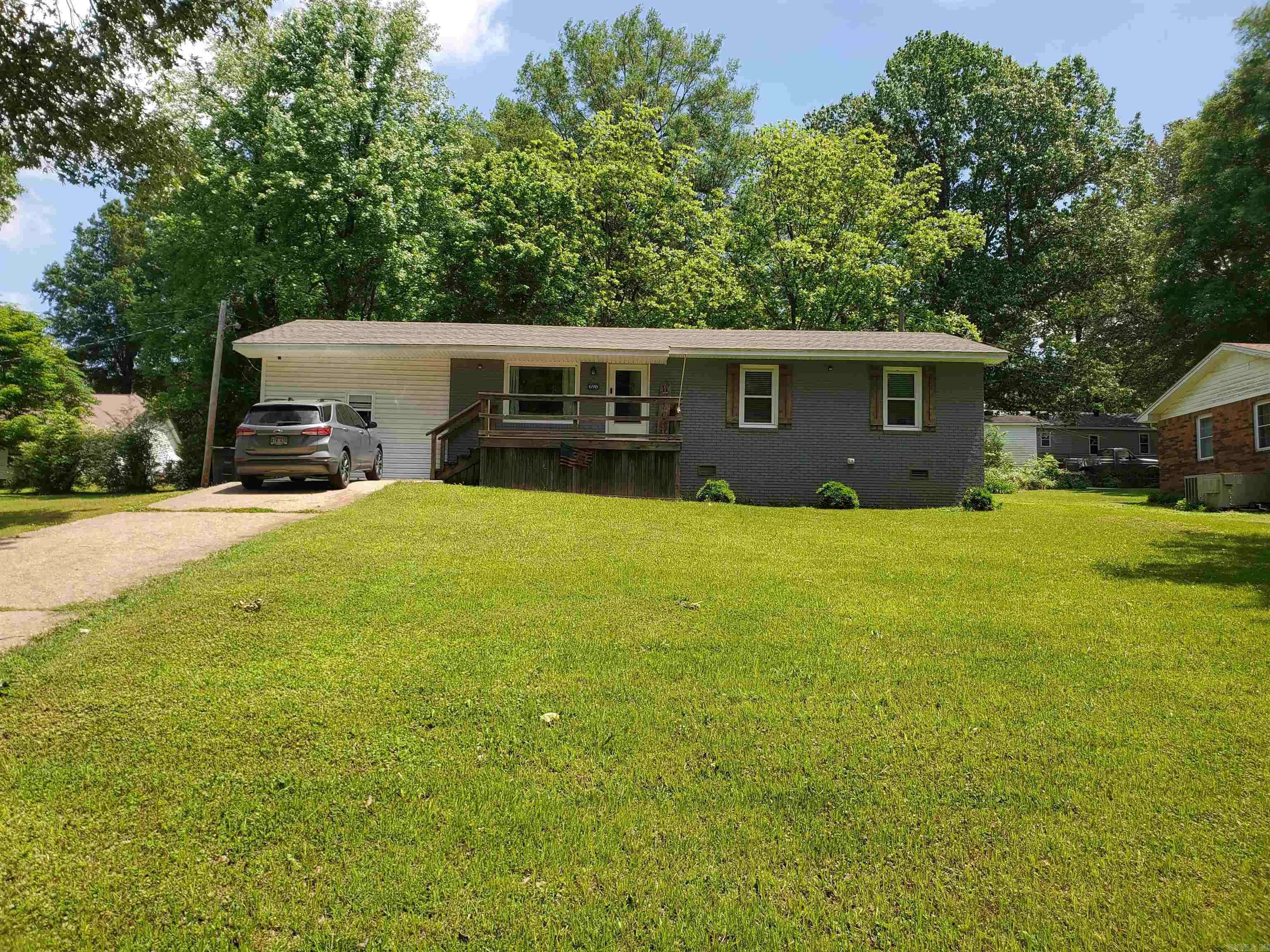 690 Redwood Dr. rests on a quite and peaceful 0.24 acre lot at the foot heals of Crowley's Ridge in Piggott, AR. This beautiful, 4BR, 2BA, 1375SF fully updated home is perfect for that growing family! The privacy fence in the back yard and above ground swimming pool are perfect for playing and relaxing all in the comforts of your own backyard!
