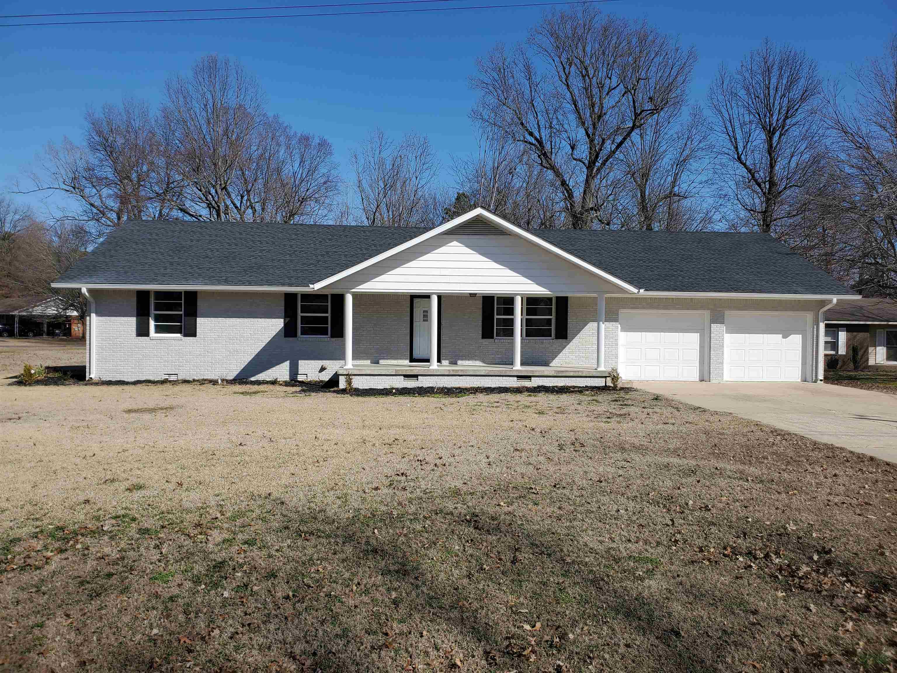 1017 Homecrest Dr in Piggott, Ar. is a 3BR, 2BA, 1,581SF home sitting on a huge 0.67-acre lot in the heart of Ballard Heights just beside the Sugar Creek Country Club! This stunning brick home has been completely gutted and remodeled from top to bottom, inside and out! The kitchen is an absolute work of art with stunning new stainless-steel appliances and a gorgeous new granitite countertop! The open floor plan with lots of windows allows for the sun to shine throughout the kitchen, dining and living room areas! A peaceful sunroom, just off the dining room, lets you relax and soke in the beautiful backyard overlooking sugar creek. Three large bedrooms gives everyone their own private space. The master has its own newly remodeled bathroom! The large 2 car garage has a built-in workshop that gives plenty of space to work on projects and store your tools. The huge 0.67-acre lot gives the kids plenty of room to play ball, or to plant that dream garden, or build that perfect man-cave shop you've always wanted! This amazing property, in one of the best neighborhoods around, can be your forever home!!