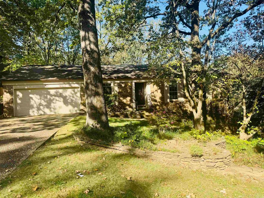 3 bedroom 2 bathroom home tucked away on a quiet cul-de-sac. Walk in from your 2 car garage into the spacious eat in kitchen. The main living room features a gas log fireplace. There is also another living/dining room for extra space. Down the hallway are the 3 bedrooms and 2 bathrooms. Backyard has extra landscaping and rock pathways throughout. Sprinkler system. New HVAC.