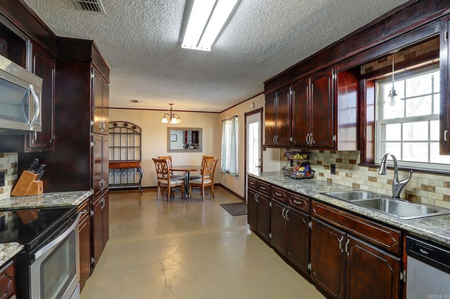 This spacious ranch-style home, set on approximately 4.5 acres in the sought-after Genoa school district, offers the perfect blend of comfort and functionality. With 4 bedrooms and 3 full baths, there’s plenty of room for family and guests. The home features a nice-sized living room and a separate game room, providing great space for relaxation and entertainment. The open kitchen boasts ample workspace and storage, making meal prep a breeze. A HUGE laundry/mudroom adds extra convenience for busy households. Stained concrete floors flow through the public areas, offering durability and style. Additional highlights include a new roof installed in January 2024, high-speed internet access, a well, and a septic system. This property provides the best of country living with modern amenities—don’t miss this opportunity!