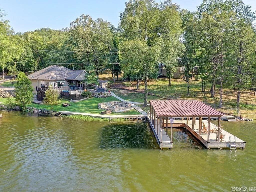 Public Auction Friday, October 9th at 11AM Contact Fowler Auctioneers for more information. Beautiful waterfront luxury home with half-acre and 172' of waterfrontage, guest house, covered boat dock . Visit www.fowlerauctioneers.com for further details.