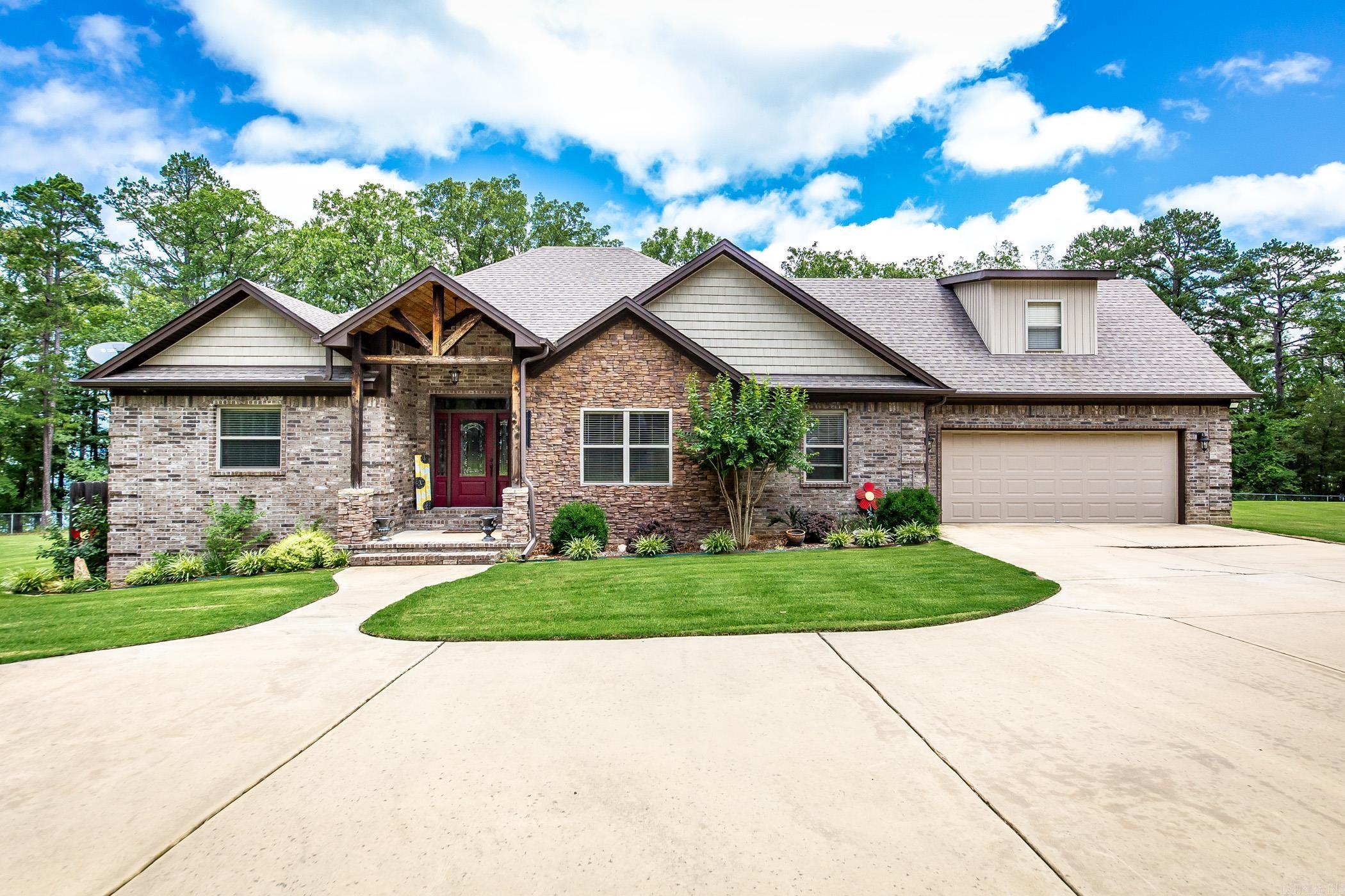 Looking for a Newer Quality Built Lake House , on Greers Ferry Lake, easy walk to the water, heated & cooled 30x50 Drive Thru Shop, 18x35 Shop w/roll up doors, 10x12 shed, a whole house backup Generator, & sits on a couple of acres (2.84 acres +/-), then Come take a look at this beautiful home & property!! This place has plenty of room for your lake toys & all of your friends. The 4th bedroom upstairs can easily be used as a bunk room/game room. The space currently being used as a gym In the 30x50 shop could make a great space for overflow guests if used as a bedroom & it has a full bathroom attached as well. Engineered wood floors in the home, carpeted bedrooms with tiled kitchen & bathrooms. Oversized laundry room & Master Bathroom has two walk in closets. The exterior consists of beautiful stone & brick work. Silver Shores Boat ramp is right around the corner, approx. 1.4 miles away.