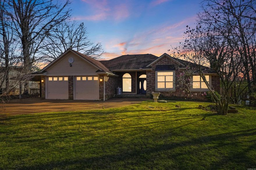 Furnished lakefront home with stunning views and a gentle walk to the water. Located with the air strip directly across the street and the boat launch just a short stroll down the road, this property is perfectly positioned for easy lake living. Recently updated, the home offers inviting spaces designed for relaxing and entertaining. The lower level features a spacious den, media room, extra-large laundry room, and an additional bedroom, providing plenty of room for family and guests. A dramatic wall of windows captures beautiful lake views and fills the home with natural light. Outdoor living is just as impressive, with expansive decks and patio areas ideal for entertaining, grilling, or simply enjoying the peaceful setting. The level front yard offers a great place for kids to play, while the oversized garage provides ample space for boats and all your lake toys. Greers Ferry Lake is known as one of the most pristine lakes in the United States, with nearby marinas and golf courses adding to the appeal of this exceptional property. Enjoy boating, fishing, swimming, and all the beauty this area has to offer.  Currently is also a vacation rental.  Explore the virtual tour.