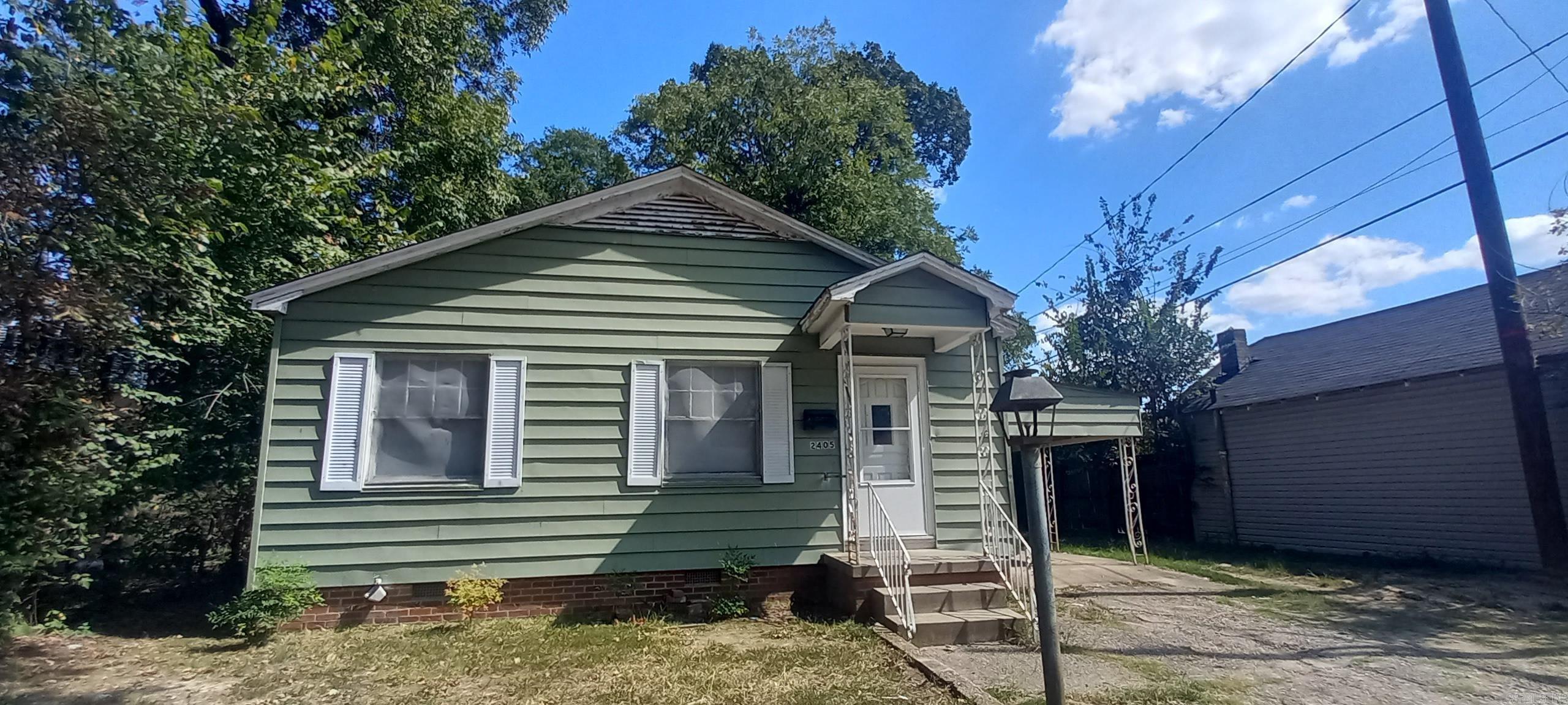 Cozy 1 bedroom, 1 bath home furnished with a fridge and stove for rent! This home is perfect for a small family! This home has a covered carpart and even a small storage shed in the back perfect for tools or lawn epuipment! Call us today to schedule a tour! 870-534-2823