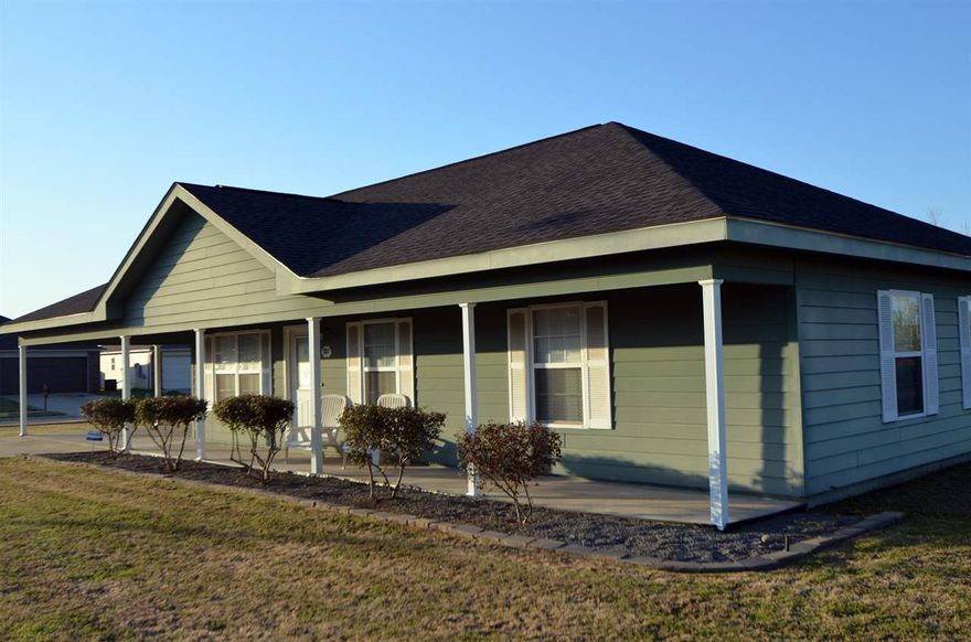 Price Reduced on this great home!  EASY, TRAFFIC-FREE COMMUTE TO DOWNTOWN metro, restaurants and airport. Tons of storage in this 3 br/2 bath immaculate home!  Open floor plan features a large kitchen w/maple cabinets, separate laundry room, walk-in closet in master, ceramic tile and laminate flooring. Double carport with locking storage area. Large, comfortable front porch. Professionally maintained lawn is as immaculate as inside of home!  MUST SEE TO APPRECIATE!