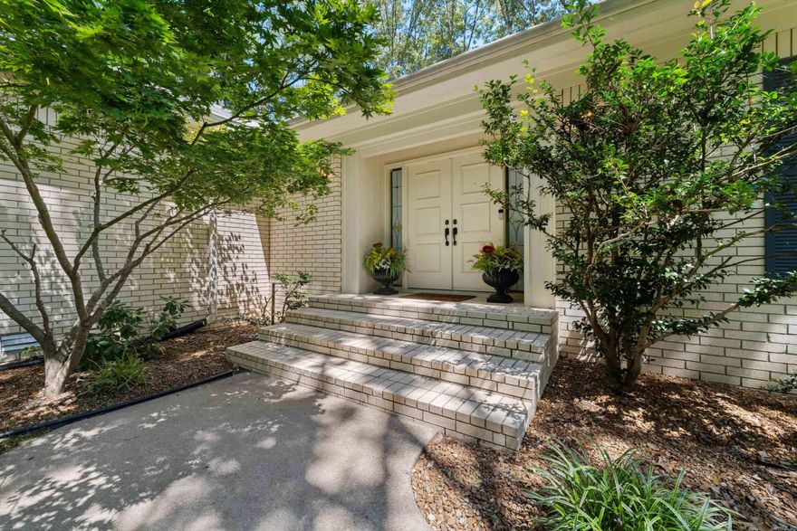 Welcome to your dream home in Heber Springs! Nestled on nearly 3 private acres w/ mature trees & a peaceful setting, this stunning designer home offers over 3,700 square feet of comfortable living space. Step inside to find 2 expansive living areas, a formal dining room,  and cozy breakfast room. Two fireplaces add warmth & charm throughout the home. This thoughtfully designed residence features 3 master-sized bedrooms all w/ walk in closets, each with its own private en-suite bathroom. A half bath serves the main living areas. On the lower level, you'll find a private bedroom/living area, walk in cedar closet, a full bath plus a secure, built-in safe room for peace of mind. Whether you're hosting a holiday dinner or enjoying a quiet evening by the fire you'll appreciate the space and flexibility this home provides. The open 2-car carport along w/ the expansive wood deck adds practicality, while the lush, wooded surroundings offer unmatched privacy & seclusion, all within minutes of everything Heber Springs has to offer. Don't miss your chance to own this rare blend of seclusion, space, & sophistication in one of Heber Springs' most desirable locations.