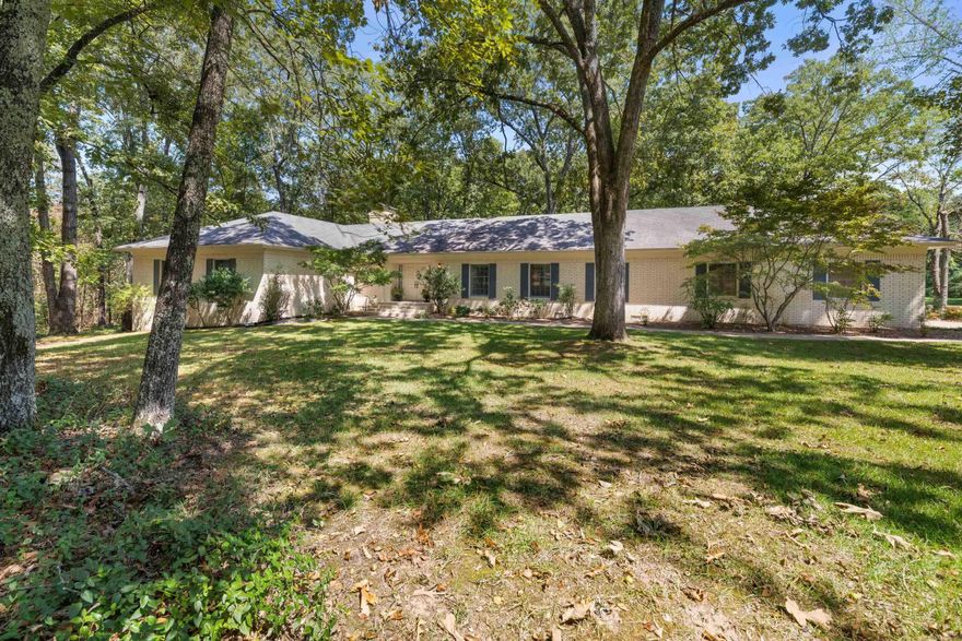 Welcome to your dream home in Heber Springs! Nestled on nearly 3 private acres w/ mature trees & a peaceful setting, this stunning designer home offers over 3,700 square feet of comfortable living space. Step inside to find 2 expansive living areas, a formal dining room,  and cozy breakfast room. Two fireplaces add warmth & charm throughout the home. This thoughtfully designed residence features 3 master-sized bedrooms all w/ walk in closets, each with its own private en-suite bathroom. A half bath serves the main living areas. On the lower level, you'll find a private bedroom/living area, walk in cedar closet, a full bath plus a secure, built-in safe room for peace of mind. Whether you're hosting a holiday dinner or enjoying a quiet evening by the fire you'll appreciate the space and flexibility this home provides. The open 2-car carport along w/ the expansive wood deck adds practicality, while the lush, wooded surroundings offer unmatched privacy & seclusion, all within minutes of everything Heber Springs has to offer. Don't miss your chance to own this rare blend of seclusion, space, & sophistication in one of Heber Springs' most desirable locations.