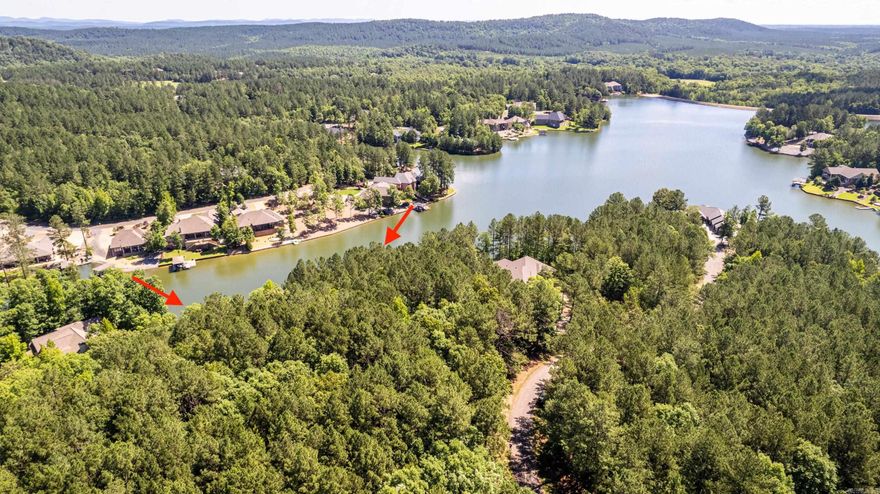 Discover Your Lakefront Dream on Lake Granada!  Discover an incredible opportunity to own lakefront property on Lake Granada! This beautiful lot offers peaceful water access and the perfect setting to build your dream home.  Located in Hot Springs Village, a premier gated community, you’ll enjoy an unmatched lifestyle surrounded by natural beauty and top-tier amenities, including:  9 championship golf courses 12 scenic lakes for boating and fishing Walking and nature trails Full fitness center & indoor pool Tennis and recreation centers Countless clubs, activities, and social opportunities Come experience everything the Village has to offer and start living the lake life you’ve been dreaming about!  See Agent Remarks *AI home rendering compliments of GreenLeaf Homes