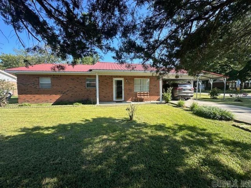 Nice brick home on corner lot. Inside is practically brand new. Fresh paint, new vinyl plank flooring, kitchen appliances stay. Sunroom. Large yard. Plenty of storage