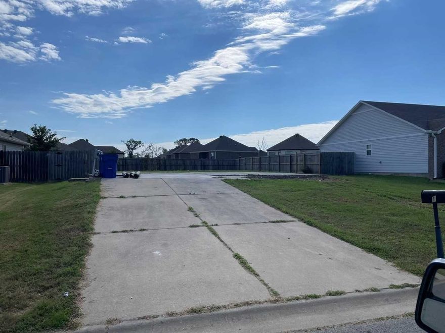 Subdivision lot  in Baywood subdivision in Greenbrier school district.  A 1307 square foot home was originally built on the lot so there is a slab, fencing, driveway and all utilities available on the lot. Lot measurements are approximate, measuring is encouraged.