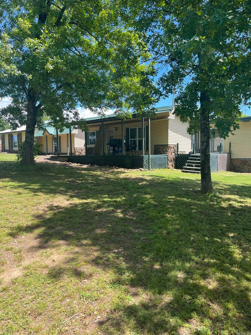 Older home with 3 bedrooms two baths, living area with a space to install a wood stove, kitchen, and dining area, all on 20 beautiful acres fenced and cross fenced, suitable for horses and cattle. Also has a good size pond.