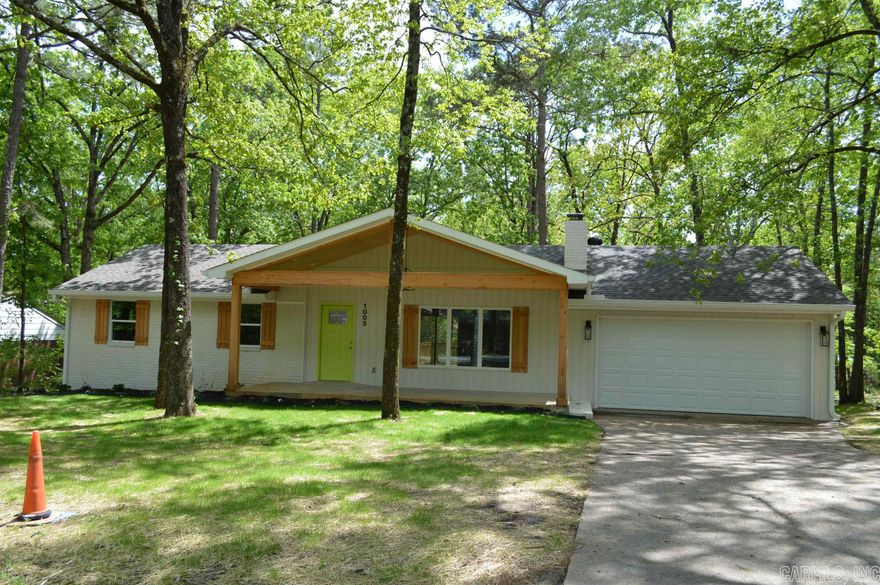 Extensive remodel: new roof, windows, kitchen and bath cabinets, heating and air, paint, flooring, pantry in laundry, deck.  Conveniently located and close to shopping, hospital, Greers Ferry Lake and Little Red River.  Carport converted to garage, new garage door opener.  Must see.  Light and airy with open floor plan.  Corners are clearly marked.