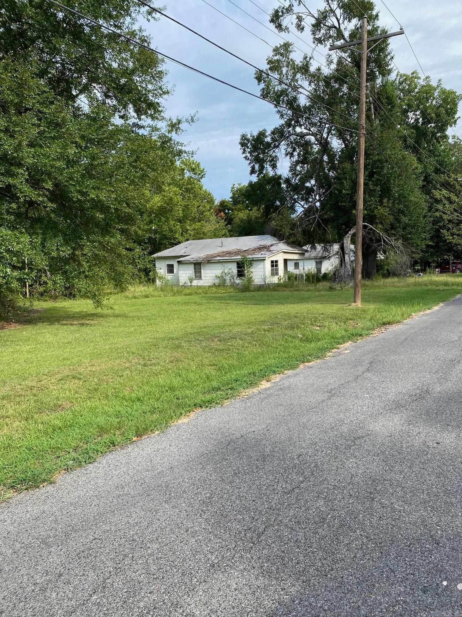 Renovators and Bargain Hunters- Don't miss out on this great investment opportunity with this fixer upper, located in the center of town.