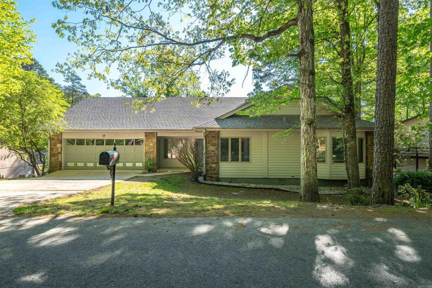 Discover easy lakefront living on beautiful Lake Segovia in the desirable West End of Hot Springs Village. This updated one-level home offers over 2,000 sq ft, featuring 3 bedrooms, 2 baths, and a 2-car garage. Freshly painted with numerous recent upgrades, the home feels move-in ready the moment you walk in. The open layout flows seamlessly to a spacious deck—perfect for outdoor living, morning coffee, or sunset views over the water. A gentle, low-maintenance backyard leads directly to the lake, creating a peaceful setting in a quiet, established neighborhood. Enjoy the convenience of West End shopping, dining, healthcare, and everyday essentials just minutes away, while still benefiting from the unmatched amenities of Hot Springs Village—including 9 golf courses, lakes, trails, pickleball, fitness center, and gated security. Whether you’re seeking a primary home, vacation retreat, or investment property, this lakefront gem checks all the boxes. Furnishings available for sale to make this completely turnkey! Don’t miss this rare opportunity for lakefront living in America’s largest gated community.